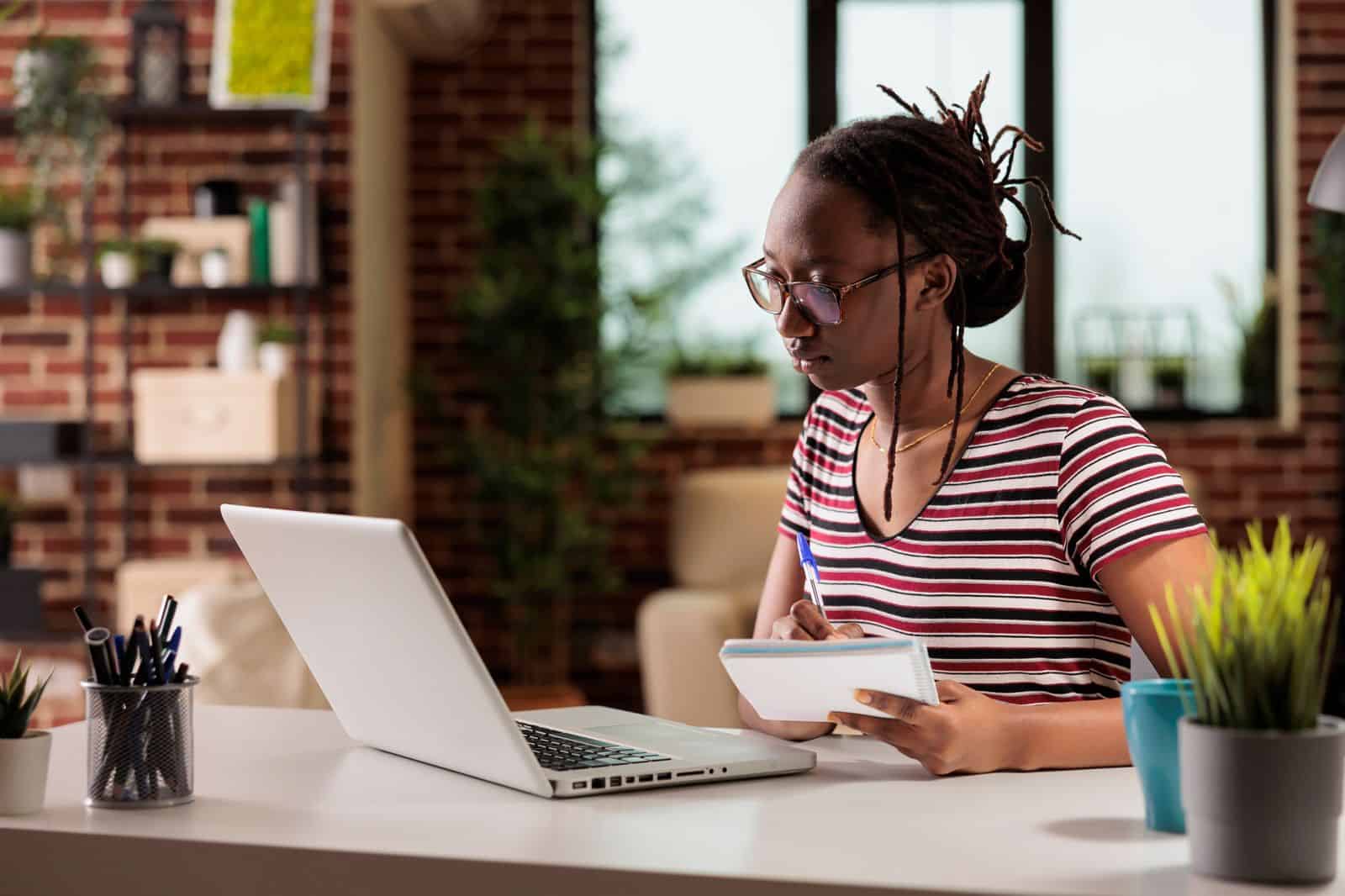 A youth focused on schoolwork.